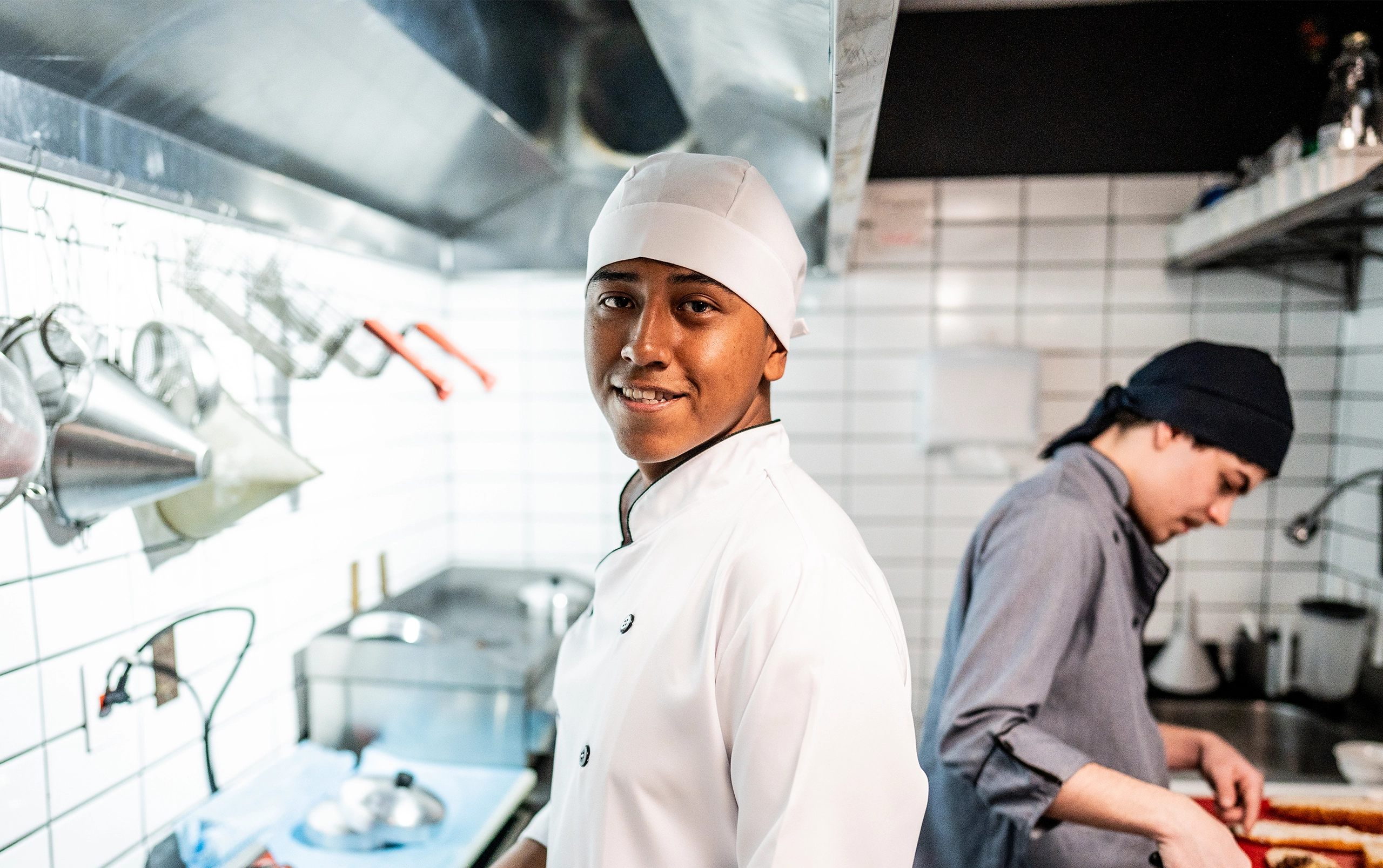 Restaurant ROI Playbook - kitchen staff at grill